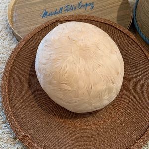 Vintage straw hat with pink feathers